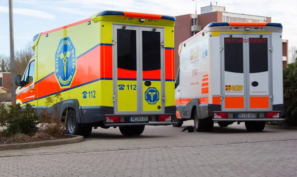 Two german ambulance vehicles stands on hospital at peine / germany — Stock Photo, Image