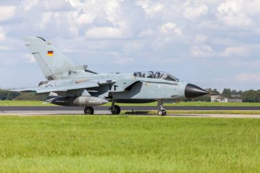 german jet fighter drives on military airbase clipart