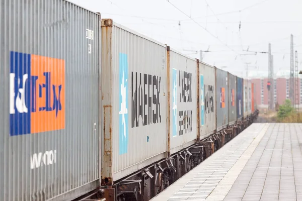 NIENBURG / GERMANY - SEPTEMBER 09, 2012: a good container train drives through trainstation.