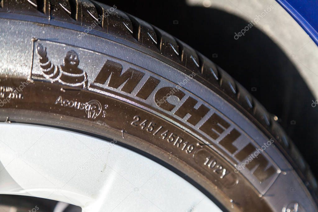FUERTH / GERMANY - MARCH 4, 2018: Michelin logo on a tire. Michelin is a French tyre manufacturer based in Clermont-Ferrand in the Auvergne region of France.