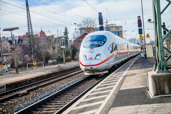 FUERTH / GERMANY - MARCH 11, 2018: ICE 3, intercity-Express train from Deutsche Bahn passes train station fuerth in germany.