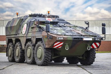 MUNSTER / GERMANY - FEBRUARY 12, 2020: German armoured medical vehicle, GTK Boxer, from Bundeswehr stands on a platform.