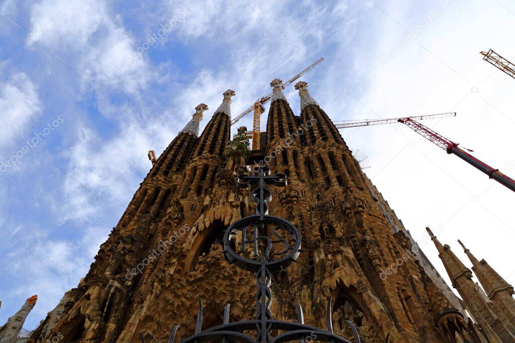 Cathedral of La Sagrada Familia. It is designed by architect Antonio Gaudi and is being built since 1882 with the donations of people