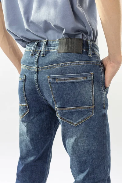 Man Jeans Spijkerbroek Close Witte Achtergrond Blauwe Jeans Blauw Shirt — Stockfoto