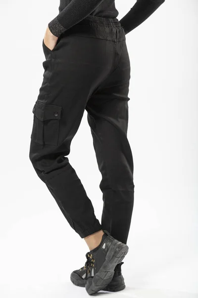 Girl Black Military Trousers Black Sports Sneakers White Background — ストック写真