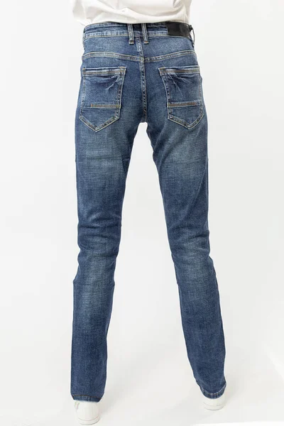 Flicka Jeans Visar Upp Jeans Vit Bakgrund Närbild Blå Jeans — Stockfoto