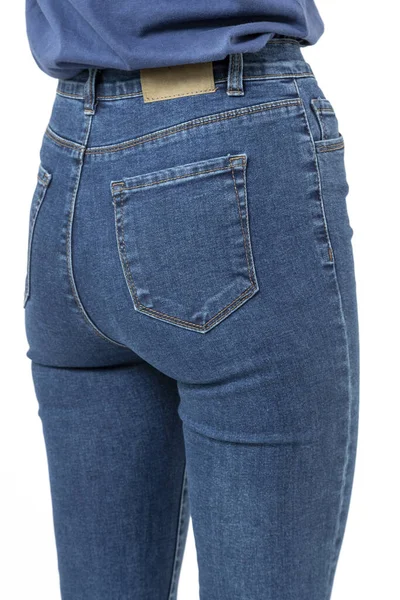 Flicka Jeans Visar Upp Jeans Vit Bakgrund Närbild Blå Jeans — Stockfoto