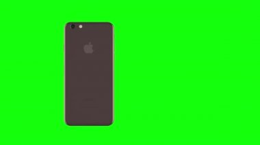 Altın telefon yeşil arka plan üzerinde dönen gül