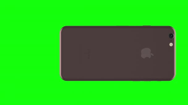 緑の背景の金の携帯電話を回転させるローズ — ストック動画