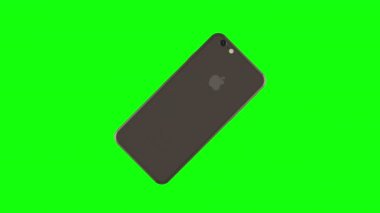 Altın telefon yeşil arka plan üzerinde döndürme