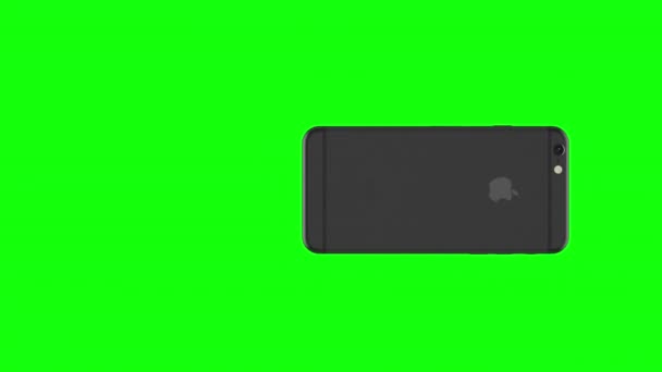 Espacio teléfono gris girando sobre fondo verde — Vídeo de stock