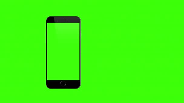 Smartphone draait op groene achtergrond — Stockvideo