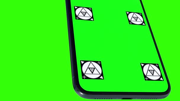 Geïsoleerde slimme telefoon met groen scherm — Stockvideo
