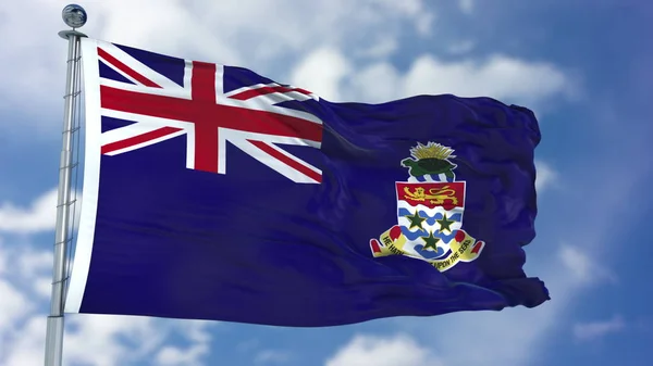 Kajmanské ostrovy vlajka v modré obloze — Stock fotografie
