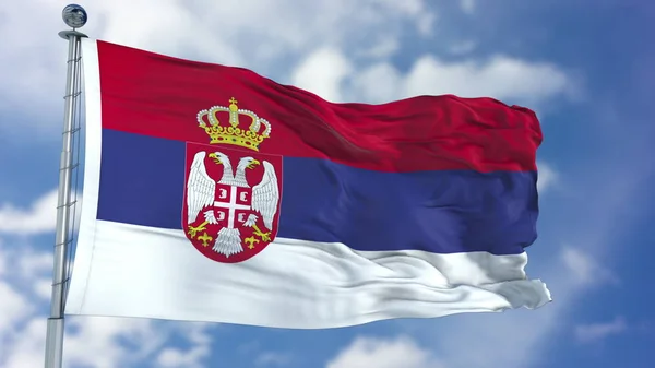 Srbsko vlajka v modré obloze — Stock fotografie