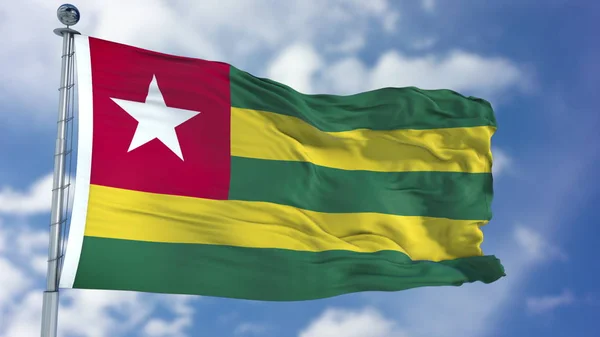 Flaga Togo w błękitne niebo — Zdjęcie stockowe