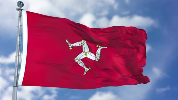 Isle of Man vlag in een blauwe hemel — Stockvideo