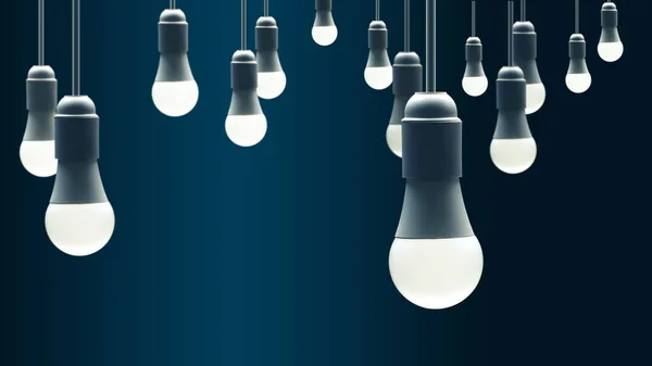 Birçok LED lambası koyu mavi bir arka planda parlar. Yaratıcılık kavramı.