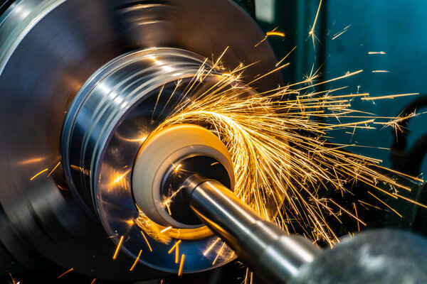 Internal processing of a polished surface with sparks in the workplace.