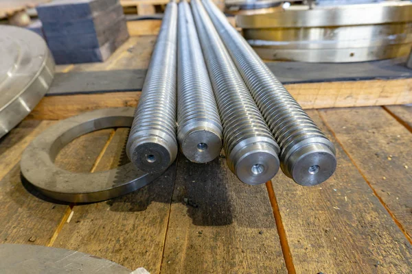 Helical shaft after turning and milling in the warehouse. — 스톡 사진