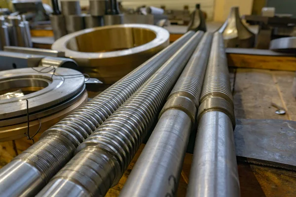 Helical shaft after turning and milling in the warehouse. — 스톡 사진