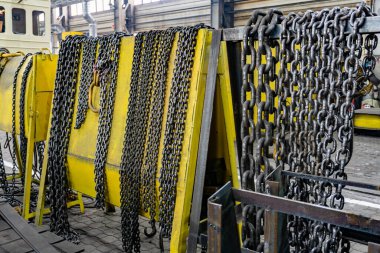 Chain for the crane on the rack, cargo slings for lifting goods.