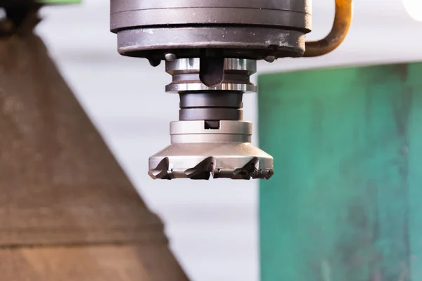 Spindle with a milling cutter in a mandrel on a CNC milling machine.