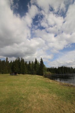 Kulübe İsveççe Ammeraan Nehri yanındaki dinlenme