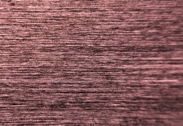 Makroaufnahme einer farbig gebürsteten Metalloberfläche mit Bewegungsunschärfe — Stockfoto