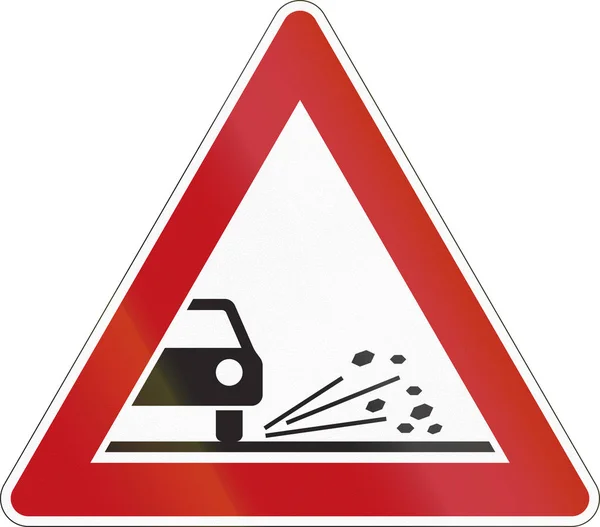 Um sinal de alerta rodoviário na Alemanha: lascas soltas — Fotografia de Stock