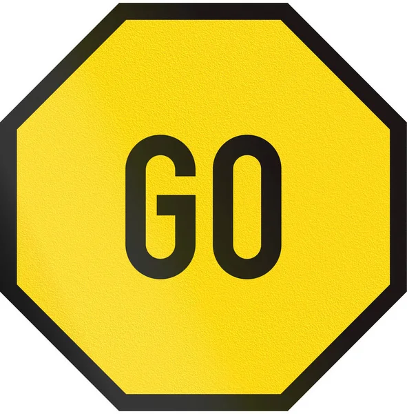 Road sign used in the African country of Botswana - Go - manual control sign — Stock Photo, Image