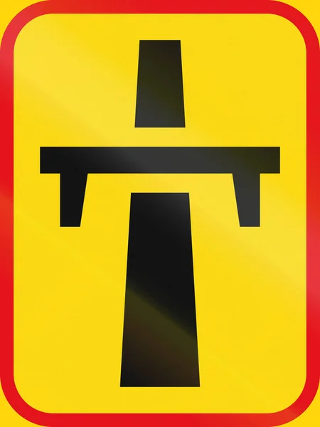 Дорожній знак, що використовується в африканській країні Ботсвані - обпалити-проїжджої частини шосе починається — стокове фото