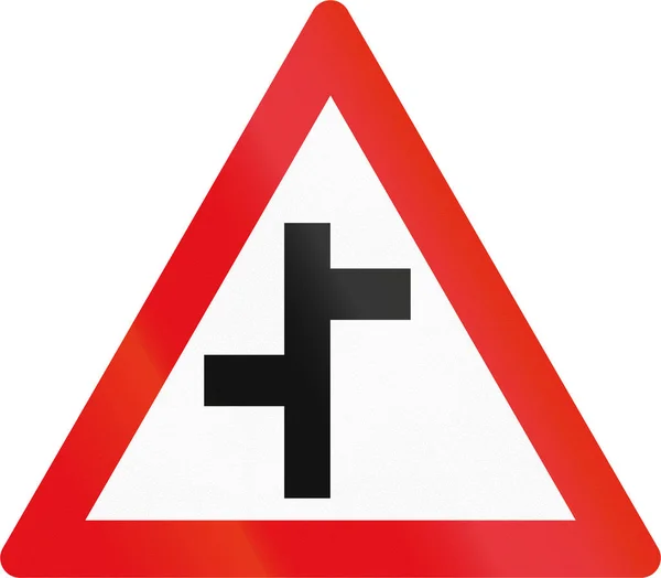 Señal de tráfico utilizada en el país africano de Botsuana - Cruces laterales escalonados —  Fotos de Stock