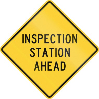 Road sign used in the US state of Texas - Inspection station ahead clipart