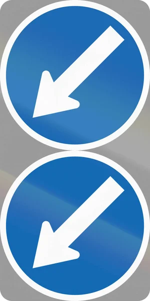 New Zealand road sign RG-17.1: Keep left (twin discs — Stock Photo, Image