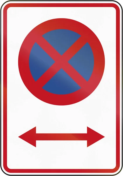 Новозеландский дорожный знак RP-1.1: Запрет остановки в направлении pescribe — стоковое фото