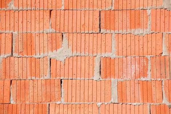 Einfache rote Ziegelwand mit Mörtel als Textur verwendbar — Stockfoto