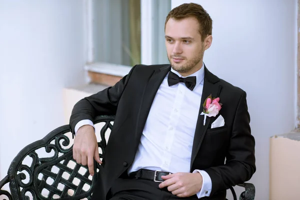 Handsome Groom in black suit — Stock Photo, Image