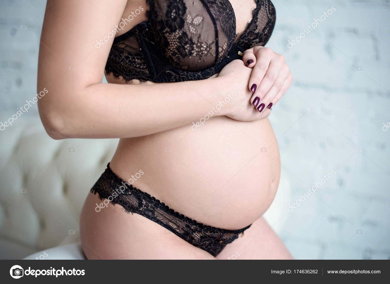 Closeup beautiful pregnant lady in elegant pose in black bra and panties Stock Photo by ©pvstory 174636262