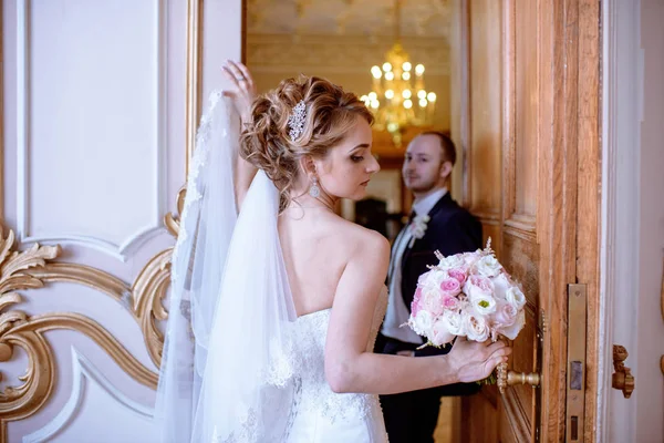 Wedding couple indoors is hugging each other — Stock Photo, Image