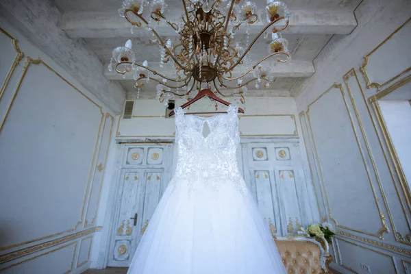 Beautiful white wedding dress for bride indoors