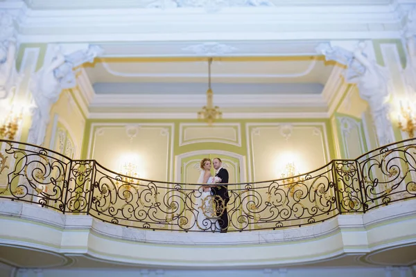 Wedding couple indoors is hugging each other — Stock Photo, Image