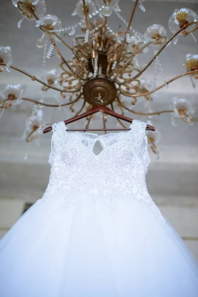 Beautiful white wedding dress for bride indoors