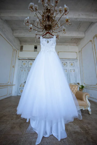 Beautiful white wedding dress for bride indoors