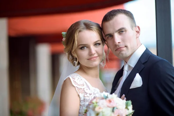 Wedding couple on the nature is hugging each other — Stock Photo, Image