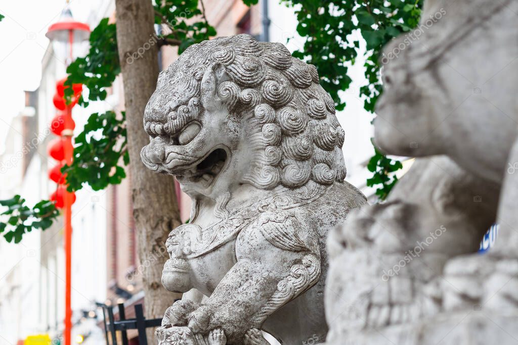 A guardian lion statue located in London Chinatown