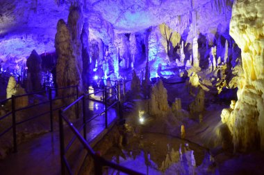 POSTOJNA CAVE, SLOVENIA - DECEMBER 21, 2017:Illumination of Postojna cave during the christmas event of Living Nativity Scenes between 25. and 30. December.  clipart