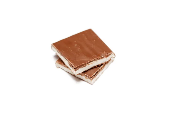 Stücke Vollmilchschokolade mit Nougat. Vanilleeis mit Milchschokolade. Süße. Dessert. — Stockfoto