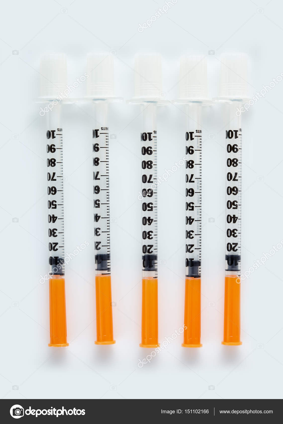 Three insulin syringes isolated on white background. Pile of Medical