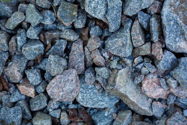 Granit çakıl doku. İnşaat malzemeleri. çakıl, ezilmiş taş, taş. gri granit çakıl arka plan karışım beton İnşaat endüstri için yukarıya kapatmak